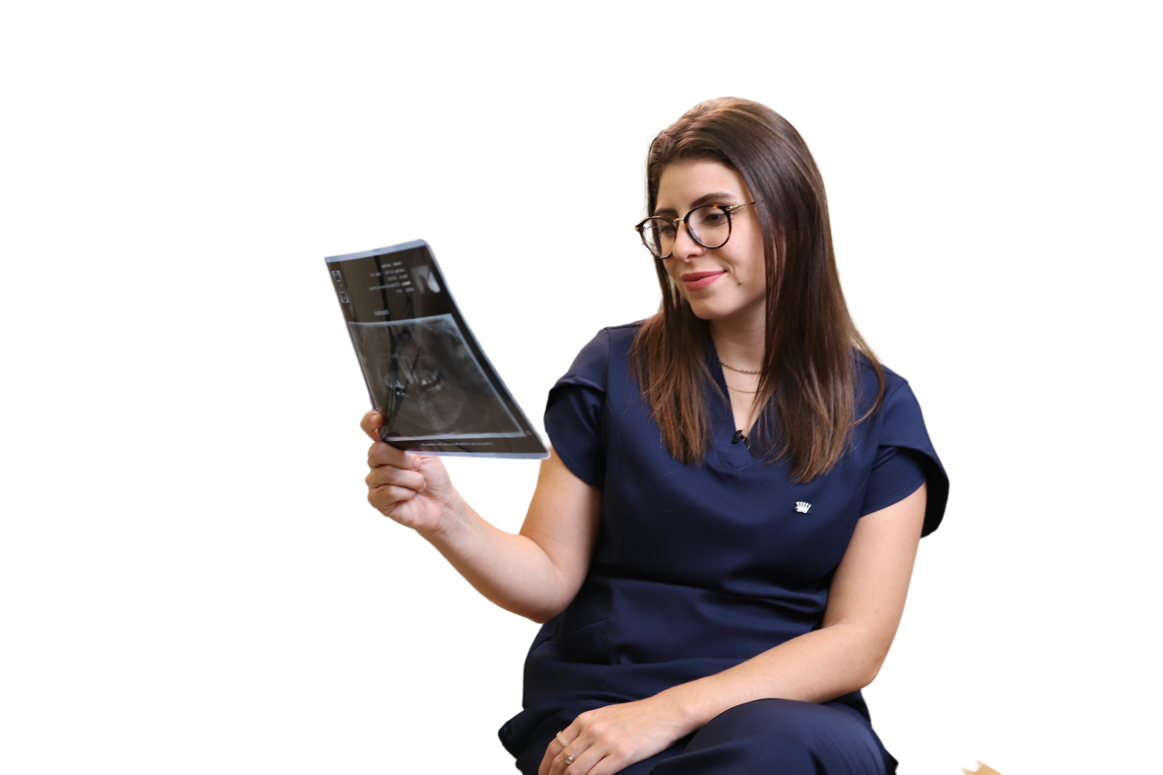 Dentist holding a cephalometric radiograph